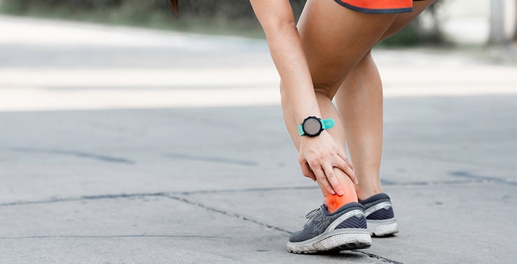 woman in pain in achilles